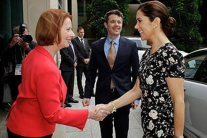 The Danish royal couple are greeted by Prime Minister Julia Gillard in Canberra.
