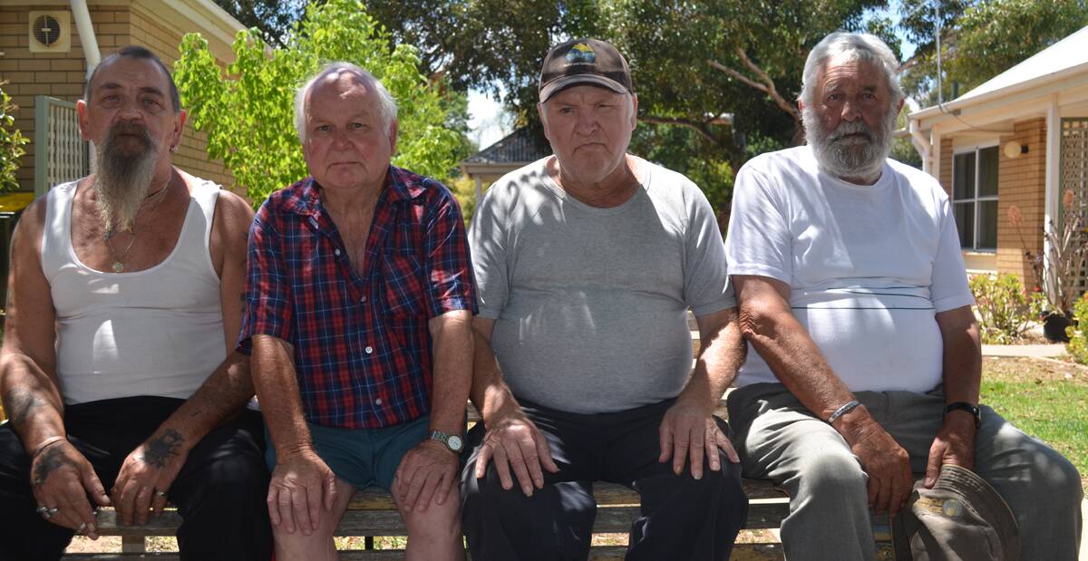 Tenants Darryle Laws, Tony Higgins, Warren Huckle and Don Gordon are not pleased with the increasing water rates. 1213waterrates(1)
