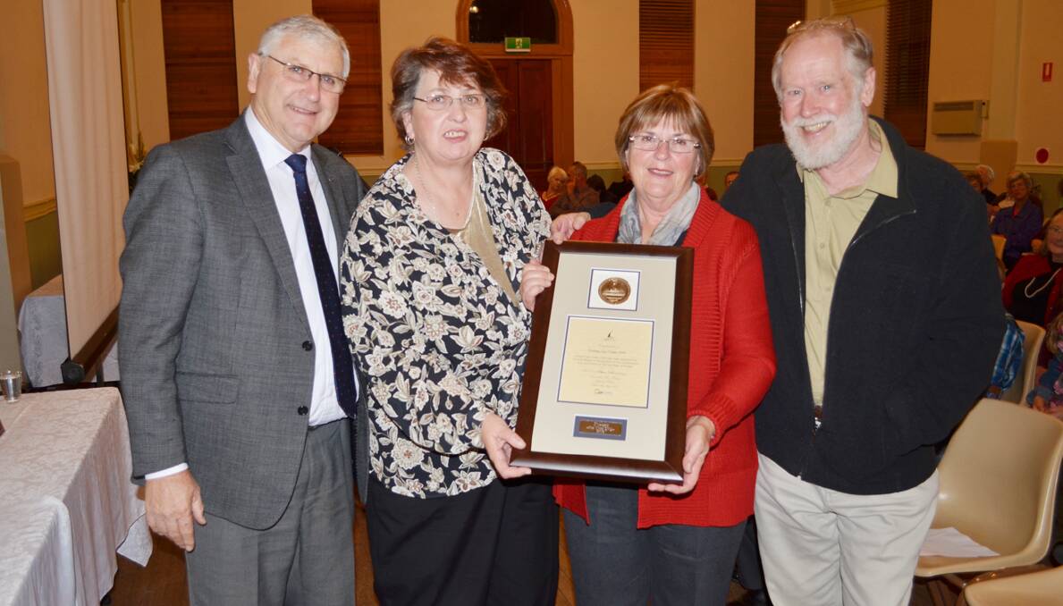 Mayor of Forbes Shire, ­Councillor Ron Penny, with recipients of the Forbes Medal Kerry Neaylon and Susan Stewart with local and national historian Rob Willis on Tuesday evening following the presentation of ­Heritage Week awards.