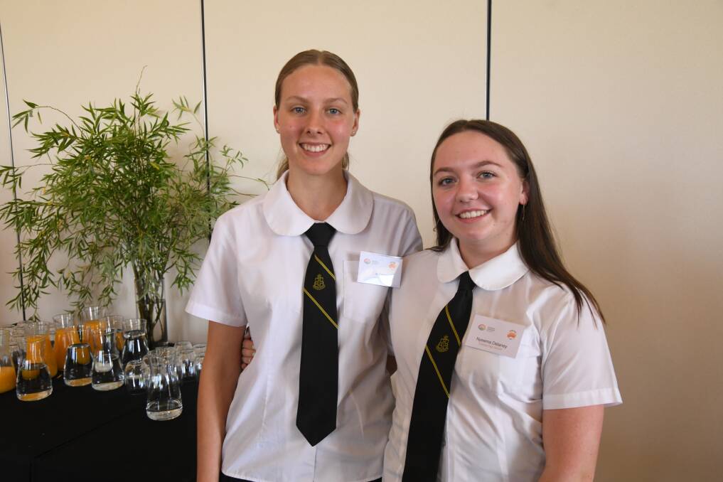 Orange High School's Zoe Tattersall and Nyeema Delaney represented their school at the Regions Rising event at Banksia Orange on Thursday. Picture by Carla Freedman.