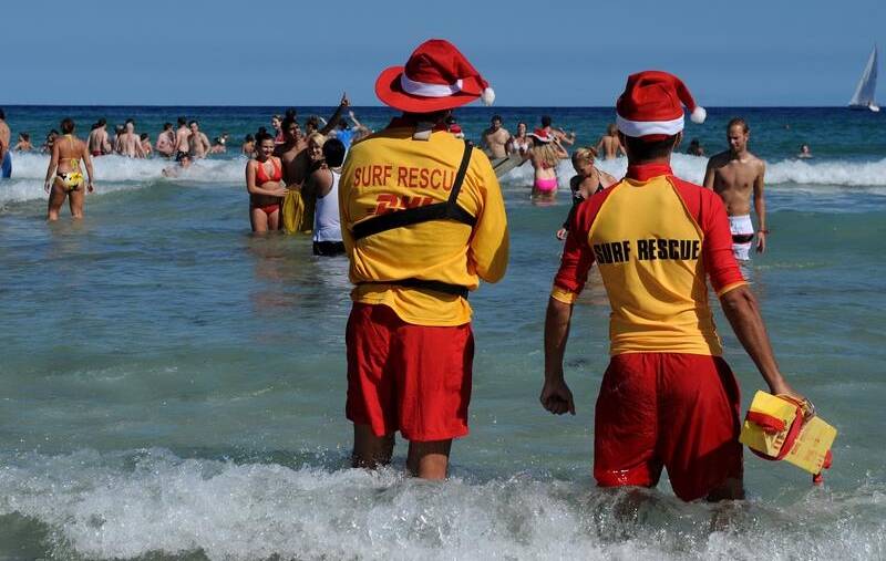 630 people were rescued in NSW in the three days since Christmas. Picture by Paul Miller / AAP PHOTOS