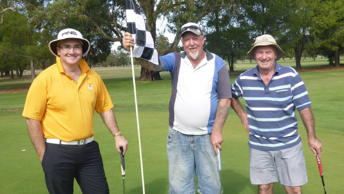 Well Played: John Zannes, Rob Webb and Peter Tisdell all smiles after finishing their Monthly medal round.