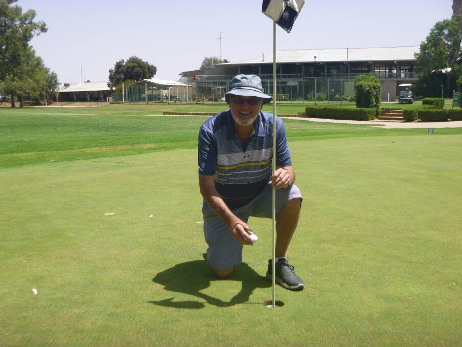 Well Played: A very pleased Pete Grayson with his Hole-in-One ball, scored on the ninth hole.