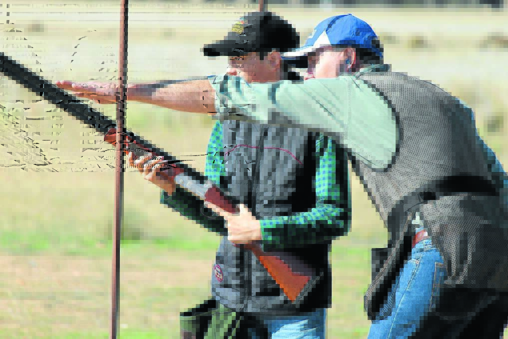 All welcome: Thirteen-year-old Cameron Smith being taught clay target shooting. Gun Club 238