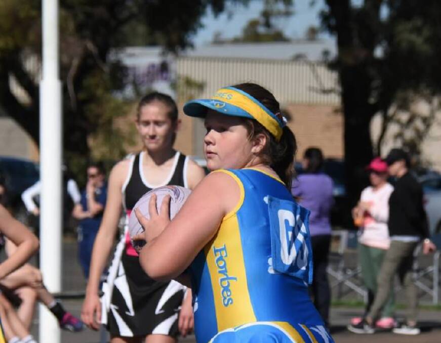 Junior State Titles: Poppy Constable in the Forbes 13s game against Cowra. The Forbes Netball Spring night competitions team nominations closing August 15.