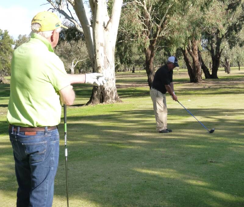 Good Play: Peter Cripps and Paul Kay: Peter Cripps giving Paul Kay some tips as Paul prepares to tee off.  Sunday, May 21 is the Stableford Medley