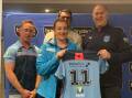 ONWARDS AND UPWARDS: Maggie Townsend accepts her NSW playing shirt for the Queensland clash, her performance has earned her selection in the Australian squad. Picture: NSW POLICE RUGBY LEAGUE FACEBOOK