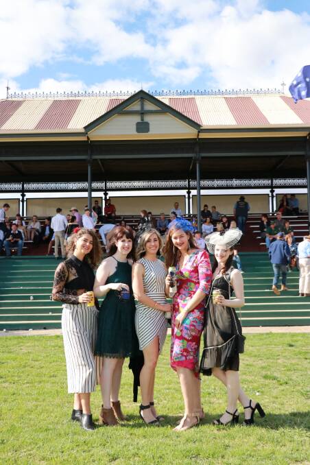 Prudence Bowe, Carly Johnstone, Leiah Diggins, Katrina Lambert and Renee van Dyke enjoying the 2018 Forbes Spring Races in front of the restored grandstand.