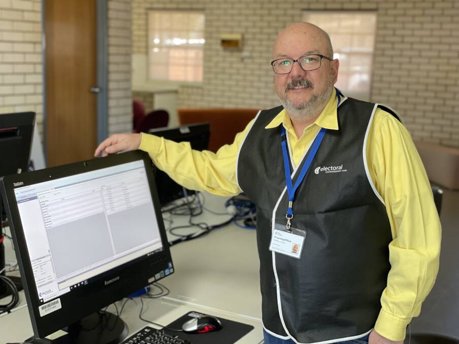 Returning officer Matthew Irvine at the distribution of preferences and declaration of the new Forbes Shire councillors. 