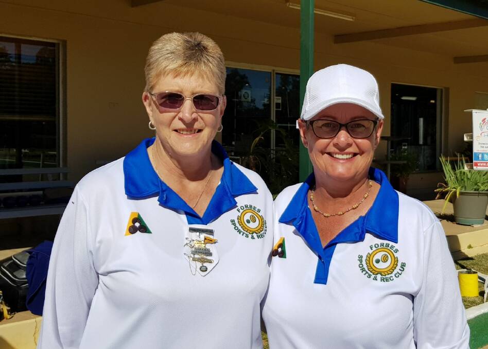 Annette Tisdell and Leisa Burton all smiles after their win in the pairs finals. 