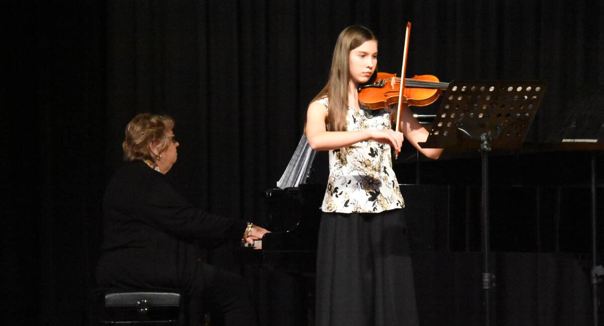 Megan Roberts won the open championship solo at the 2018 Forbes Eisteddfod with her violin performance.
