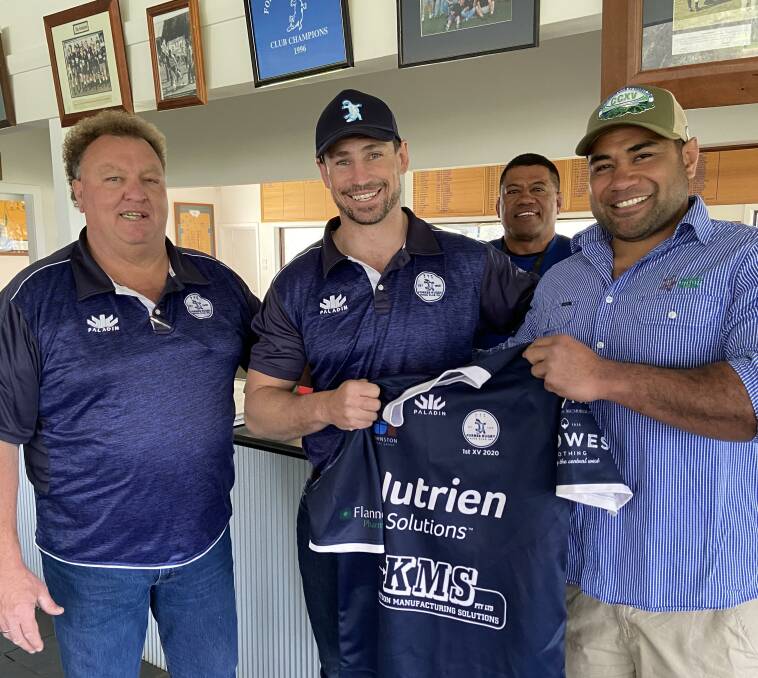 Coach Phil Prior, Mahe Fangupo and Heamani Lavaka presented Andrew Hubbard with his shirt before his 390th game for the Platypi last Saturday.