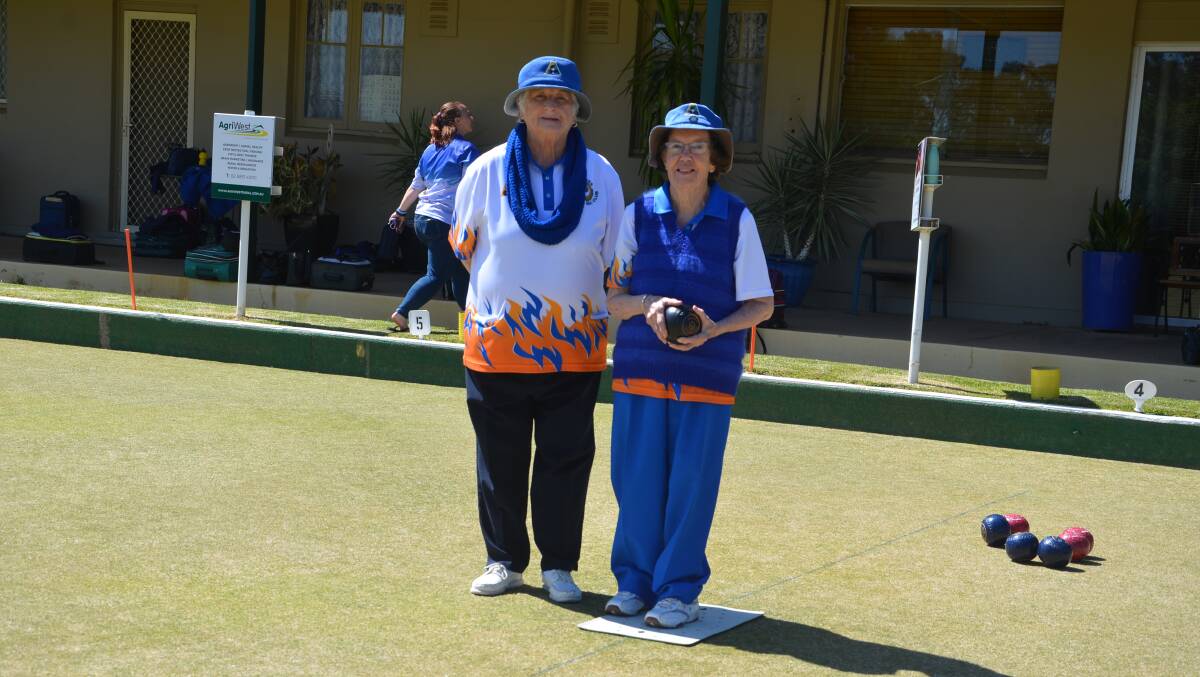 Jill Taylor and Anne Nixon on the local bowling greens at the Forbes Sports and Recreation Club.