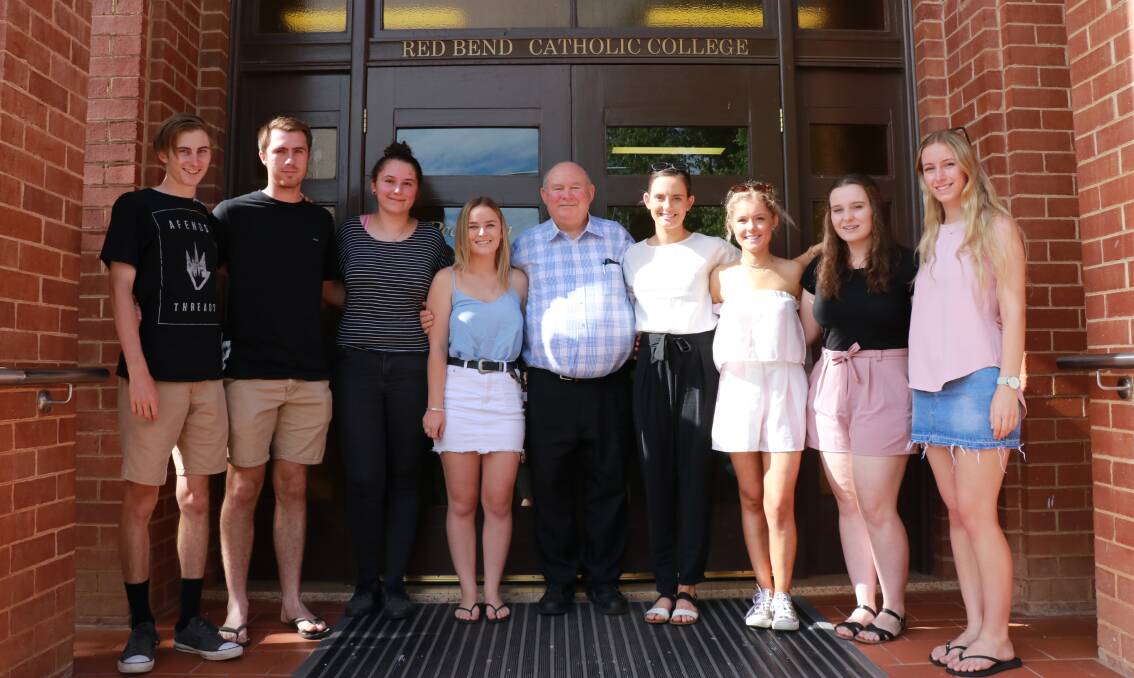 Red Bend Catholic College principal Brother Michael and happy College students Hayden Page, Simon Bayley, Samantha Girot, Sophie Welsh, Katie Hayes, Georgina McMillan, Chloe Morrison and Georgia Allegri.