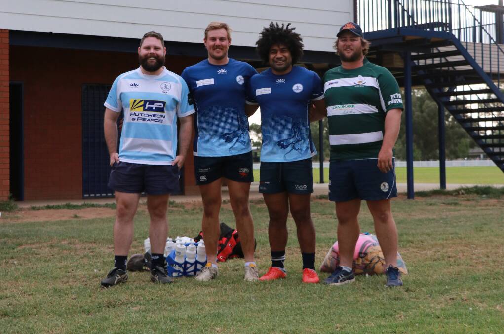 New Forbes Rugby Club president Rhys Woods with Blue Bulls Charlie French, Mahe Fangupo and Jarrod Hall who are in New Zealand this week.