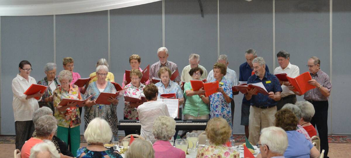The singers performing at last year's Forbes College for Seniors Christmas lunch.
