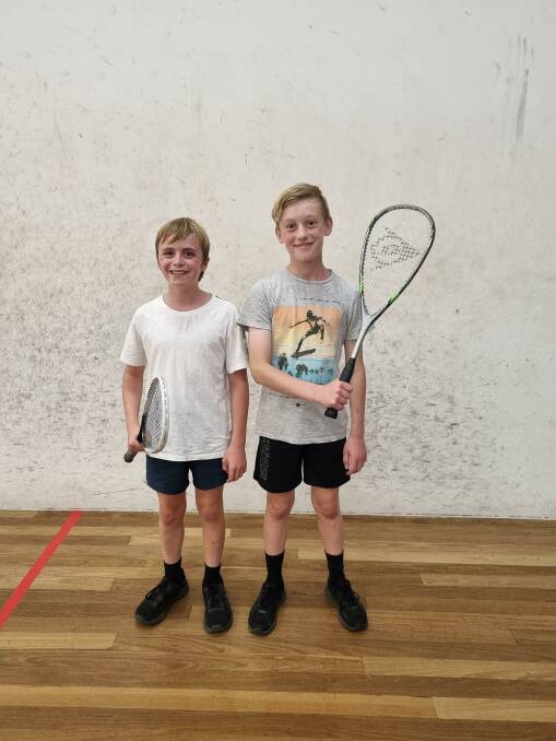 SUMMER SQUASH: Rhys Knight and Max Ridge at the Forbes squash courts. Picture: SUPPLIED