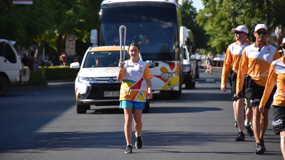 Forbes dancer Lauren Neilsen carried the Queens Baton on its journey to the Commonwealth Games on the Gold Coast. 