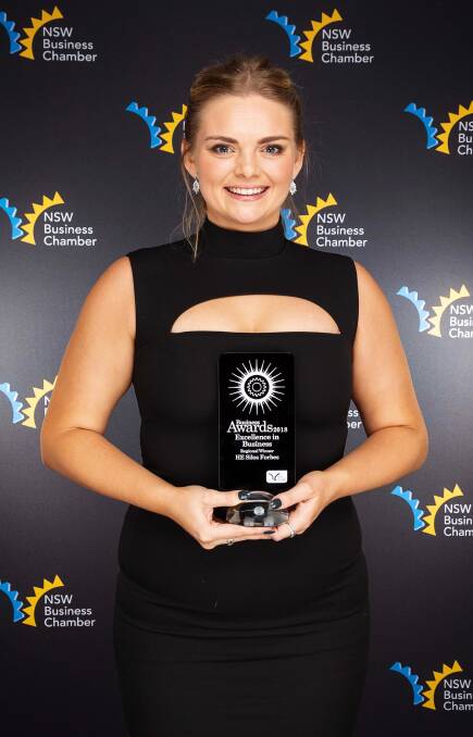 Stevie-Leigh Morrison accepted the Excellence in Business Award for HE Silos. 