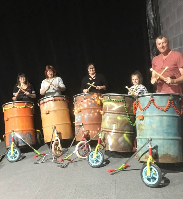 River Arts Festival 44-gallon drummers Sheryl Garner, Kathy Jones, Cathy McGrath, little Ella and Mark Hodges rehearsing for the festival finale. Photo supplied.