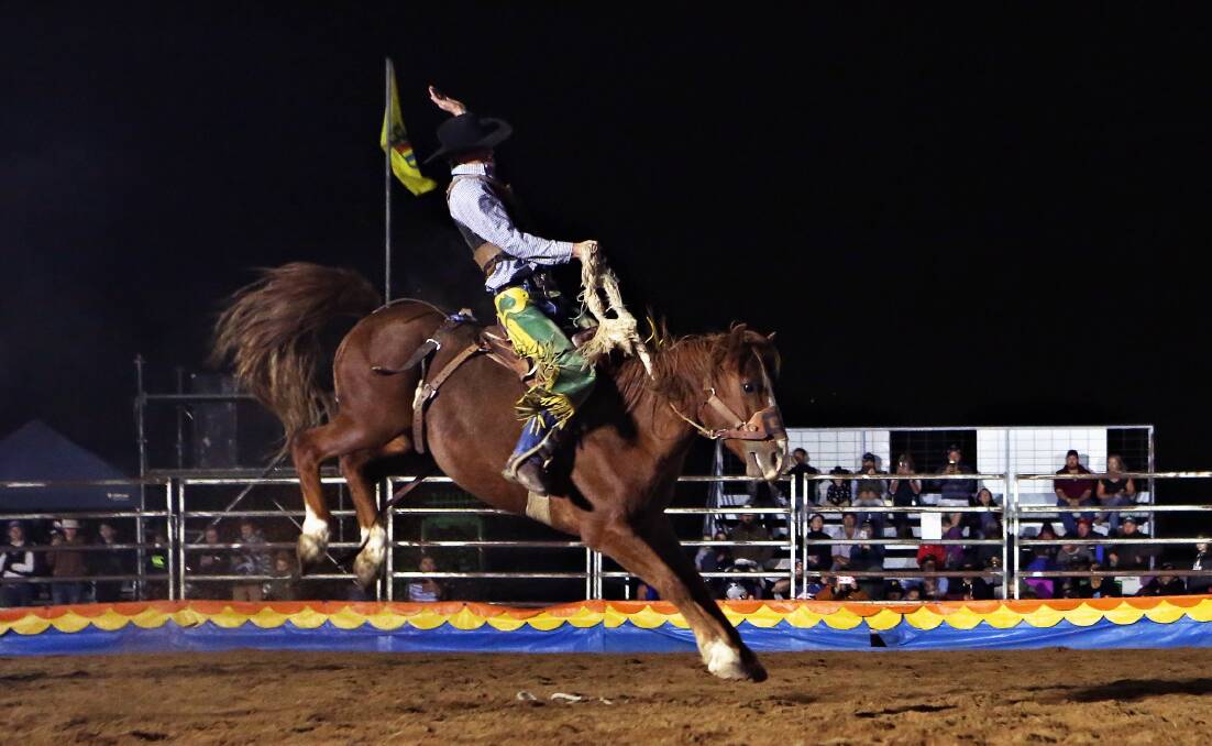 High-flying saddlebronc action at the 2018 Forbes Rodeo.