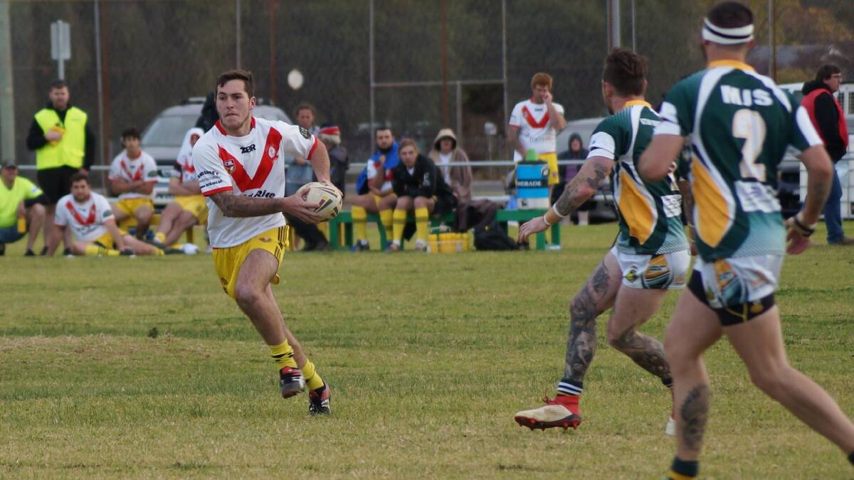 Bryce Park with the ball for Eugowra Eagles in the Trundle game. 