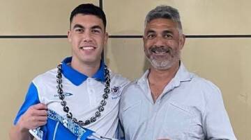 INTERNATIONAL CAP: Charlie Staines with dad Shayne at the Samoan jersey presentation. Picture: SUPPLIED