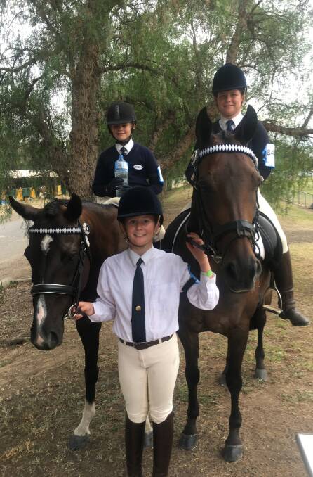 Scarlett Francis, Holly and Lottie Jacobson ready to ride at the State championships. 