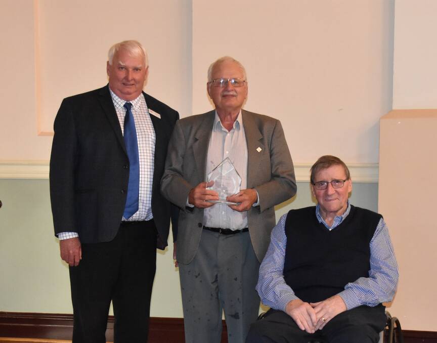 Last year's Heritage volunteer award recipients Bruce Adams and Alister Lockhart accept the award from then mayor Graeme Miller. 