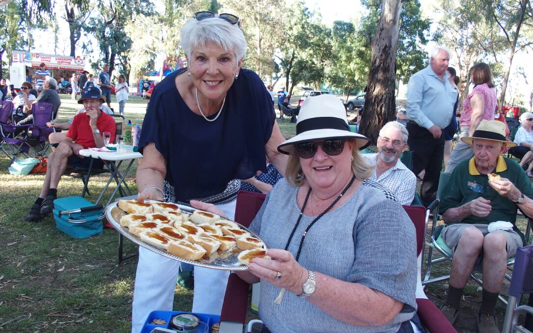 One of Forbes' Australia Day traditions is the CWA damper competition. Pictured are Margaret Adams and Robyn Miller this year.