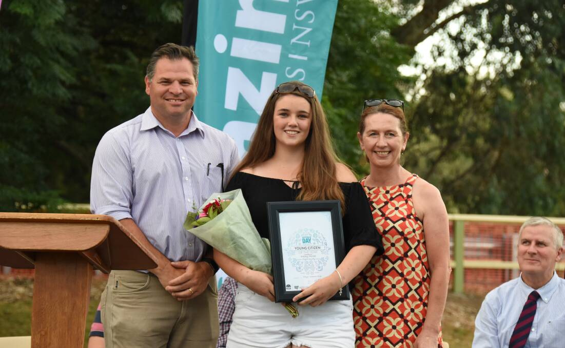 Member for Orange Phil Donato and Australia Day committee chair Cr Jenny Webb congratulate Young Citizen of the Year Kelsey Muller. 