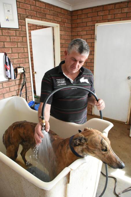 Raymond Smith and Feral Franky at the Forbes kennels. 