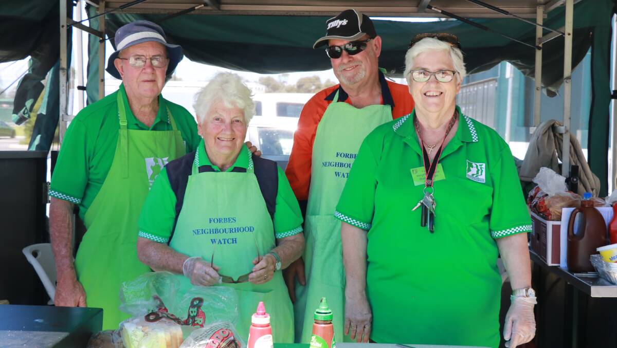 Neighbourhood Watch members Allan and Pam Toole, Rod Ridley and president Lyn Ward raising awareness and funds for the organisation at Bunnings late last year.