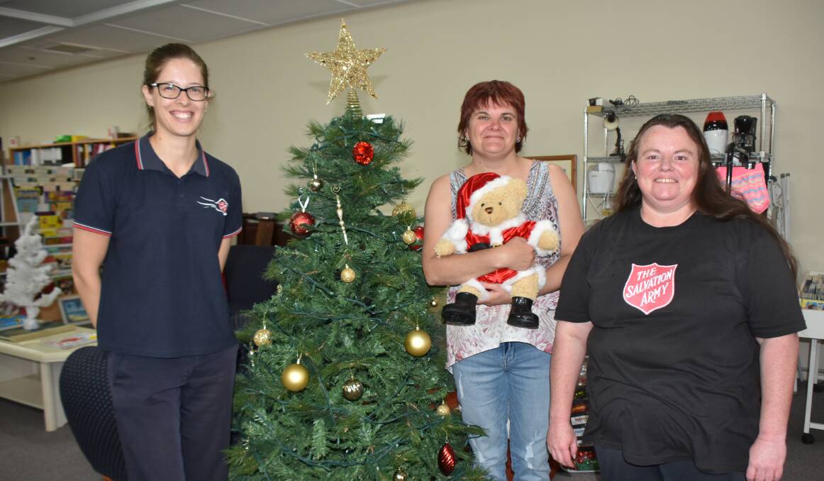 Salvation Army Lieutenant Maryanne Lovering, Megan Coffee and Joanne Sharrock encouraging people to donate new toys at the new Salvos store in Rankin Street to brighten a child's Christmas.
