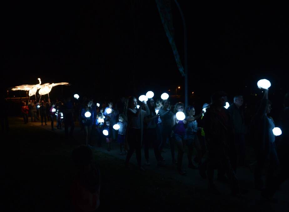 Walkers around the lake in the 2015 lantern parade. This year, the parade is the Leukaemia Foundation.