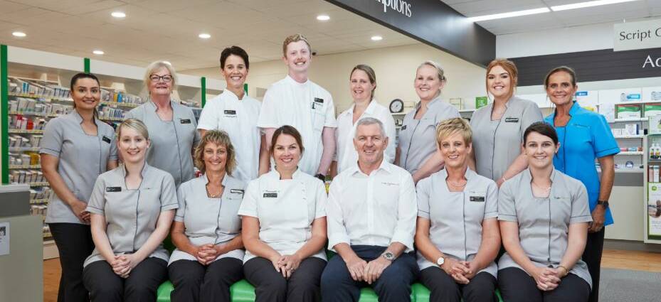 The Flannery’s Pharmacy team (back) Lish Woods, Debbie Prior, Tracey Edwards, Jack Buckley, Karina Watson, Melissa Walker, Maddie Steele, Rachel Hayes (front) Tash Cook, Michelle Grace, Sarah Hazell, Michael Flannery, Cheryl Bull and Amanda Downes. (Absent Ange Hennock). Photo supplied.