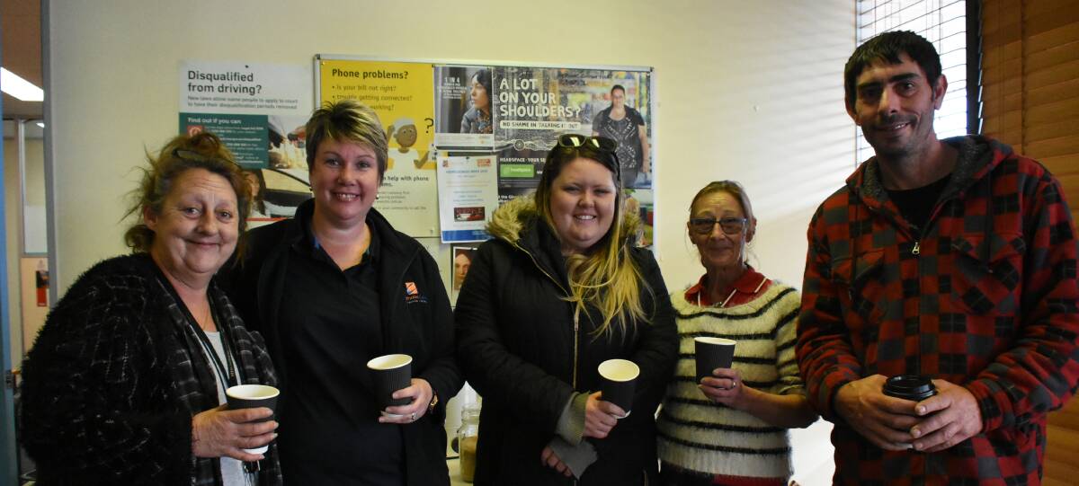 Kerry Willems, Dallas Haynes, Ellysa Cunningham, Robyn Hohnberg and Andrew Briggs sharing a cuppa at CatholicCare. 