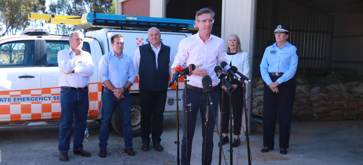 NSW Premier Dominic Perrottet with Forbes Deputy Mayor Chris Roylance, Deputy Premier Paul Toole, Minister for Emergency Services David Elliott, Forbes Mayor Phyllis Miller and NSW State Emergency Service Commissioner Carlene York in Forbes on Thursday.