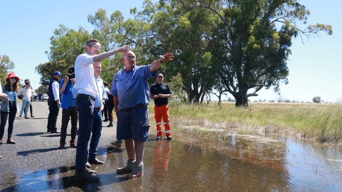 Bedgerabong farmer Scott Darcy describes the path and devastation of 2016 flooding to NSW Premier Dominic Perrottet and Deputy Premier Paul Toole.