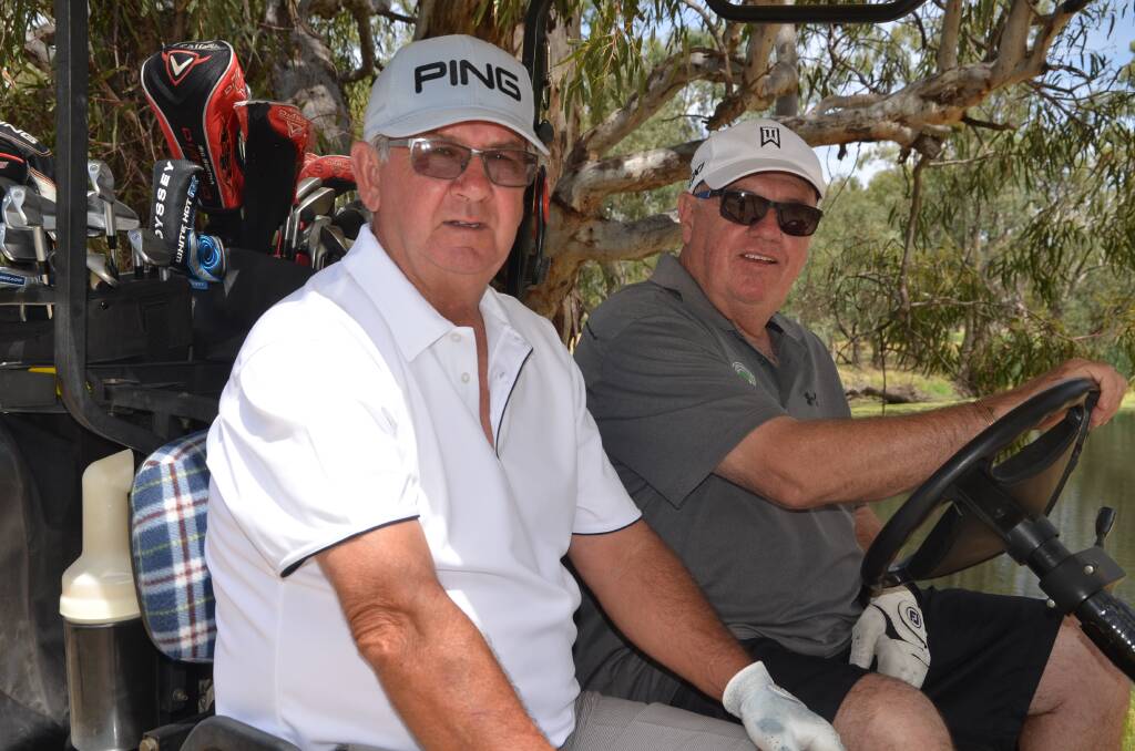 Paul Kay and Terry Griffiths enjoying a round at the Forbes golf greens.