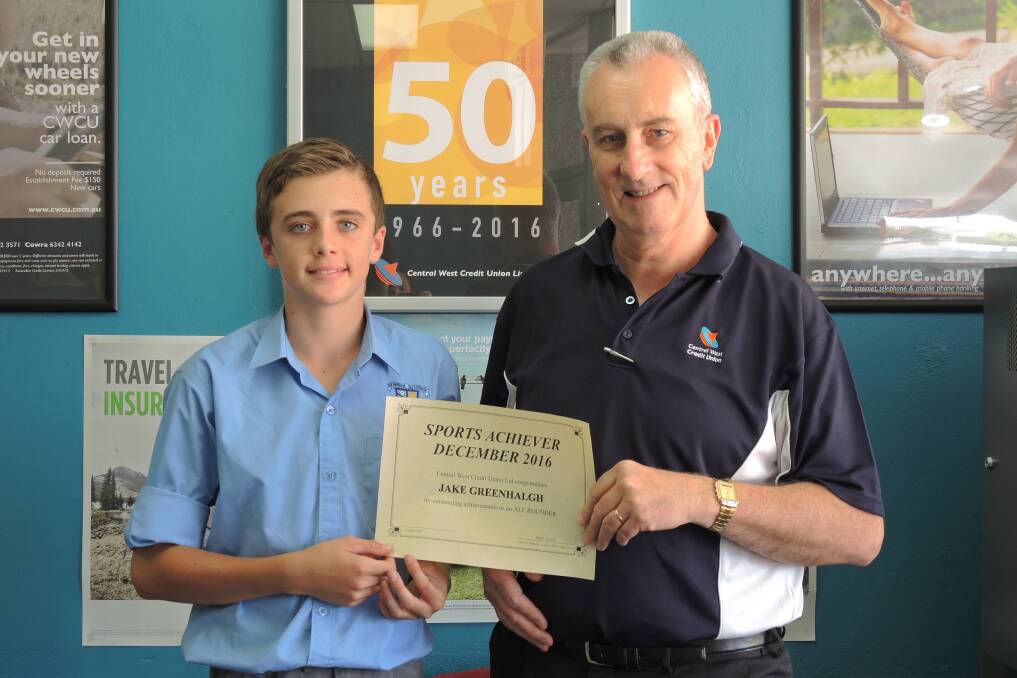 December Central West Credit Union sports achiever Jake Greenhalgh is congratulated by Bruce Facey.