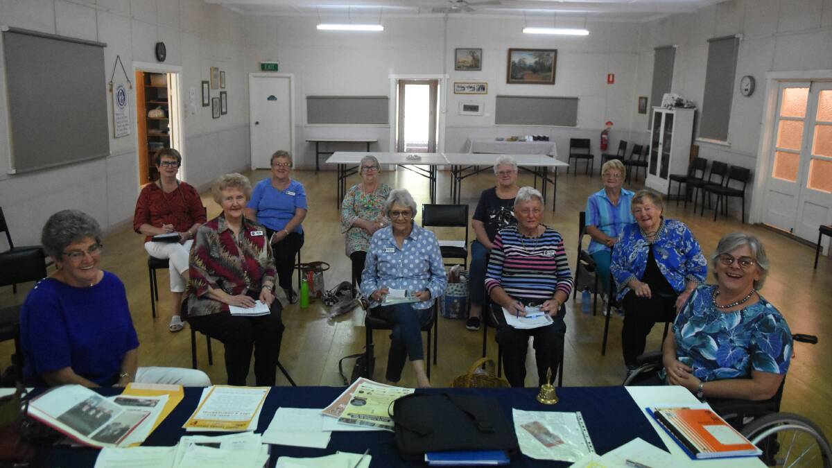 Forbes CWA President Elaine Bright (front left) and treasurer Sue Robinson (front right) with Forbes CWA members at their meeting on Thursday. 