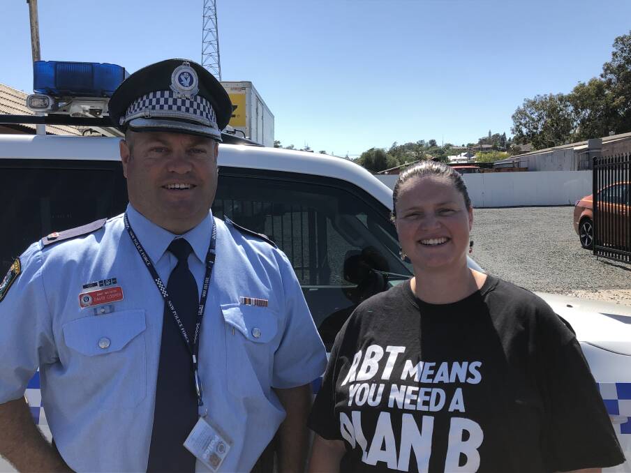 Let's have a safe Christmas! Chief Inspector David Cooper and Council's Road Safety and Injury Prevention Officer Melanie Suitor.