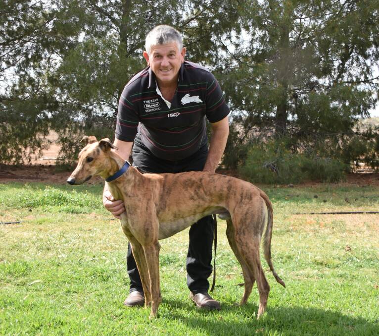 Trainer Raymond Smith with Feral Franky, who's now preparing for the semi-finals of the Million Dollar Chase.