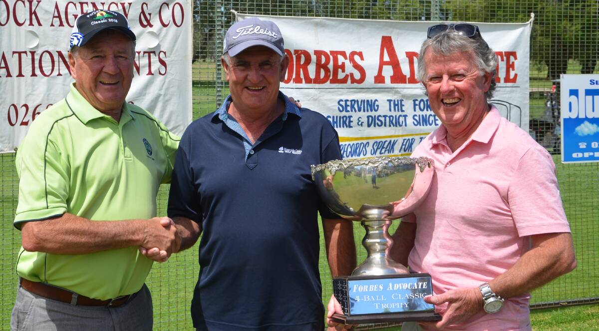 Forbes Advocate's Barry Shine congratulates 2018 Advocate trophy winners Keith McCulloch and Peter Sinclair who return this weekend.