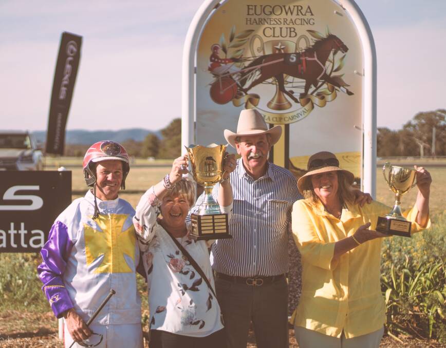 Driver Bernie and Cath Hewitt, owners Lex and Sally Crosby hold the Canola Cup high. Photo courtesy Aerial Antix www.facebook.com/aerialantix/
