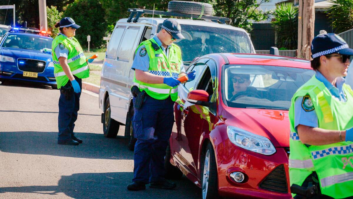 OUT IN FORCE: Highway Patrol Officers conducting random breath testing. Picture: Supplied