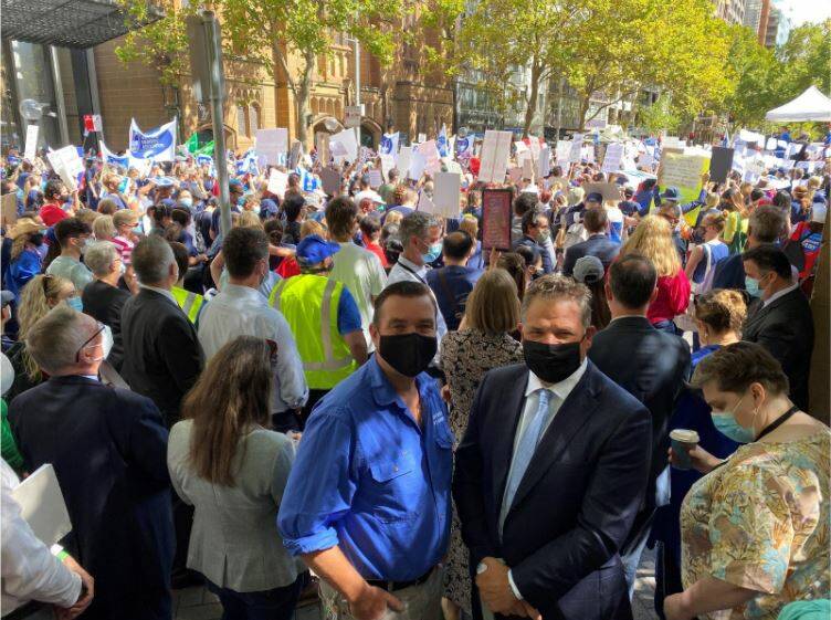 SUPPORT: Phil Donato (right), with his colleague Roy Butler MP (left), supporting nurses and midwives at the protest rally outside NSW Parliament. Photo: SUPPLIED.