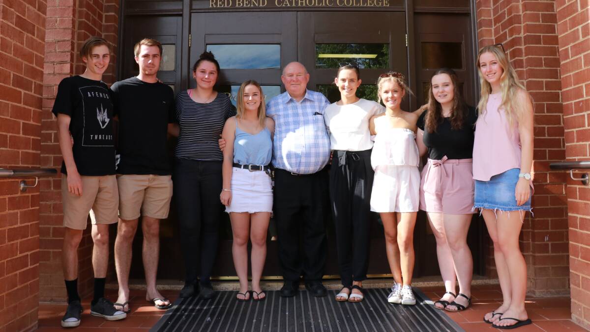 Red Bend Catholic College principal Brother Michael (centre) with happy College students Hayden Page, Simon Bayley, Samantha Girot, Sophie Welsh, Katie Hayes, Georgina McMillan, Chloe Morrison and Georgia Allegri.