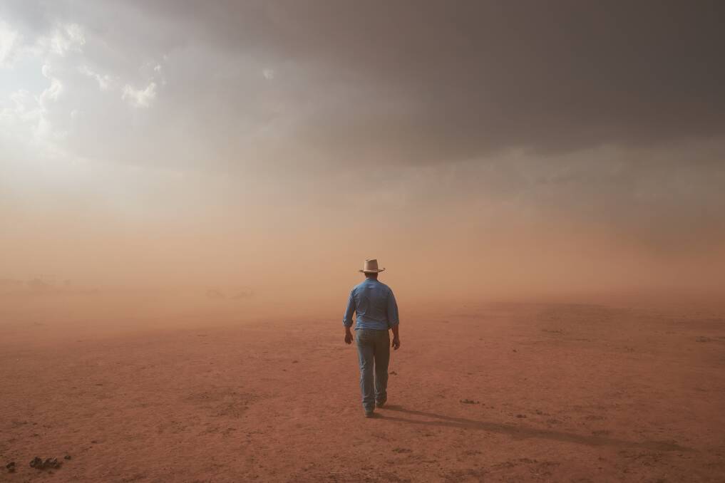 DROUGHT STORY: Joel B Pratley's photograph of Forbes farmer David Kalisch in a dust storm has won the National Photographic Portrait Prize. Photo: Joel B Pratley